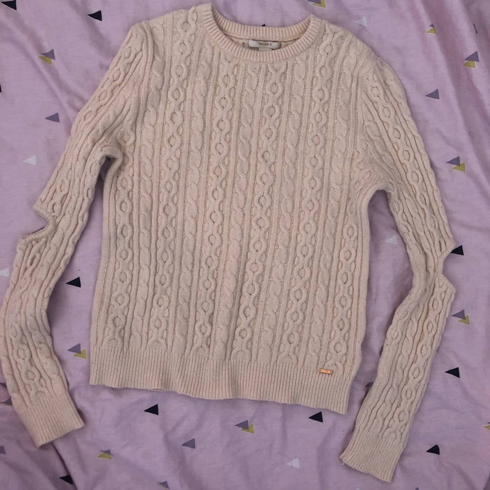 Cream colored cable knit sweater